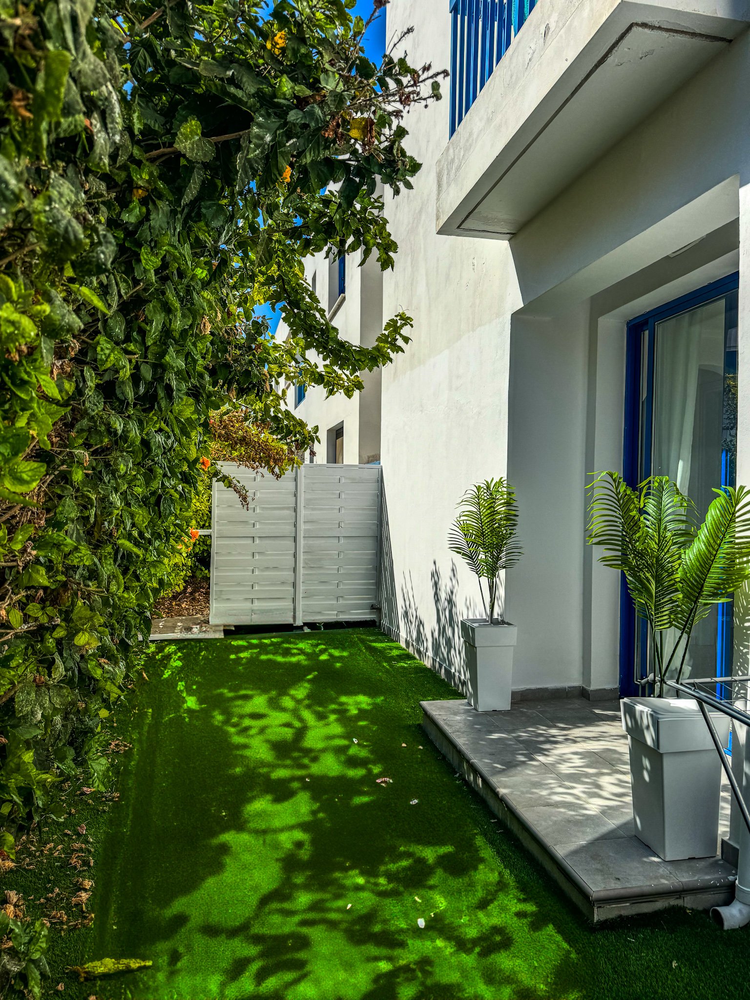 Charming Grecian-Style Ground Floor Apartment in Gated Complex