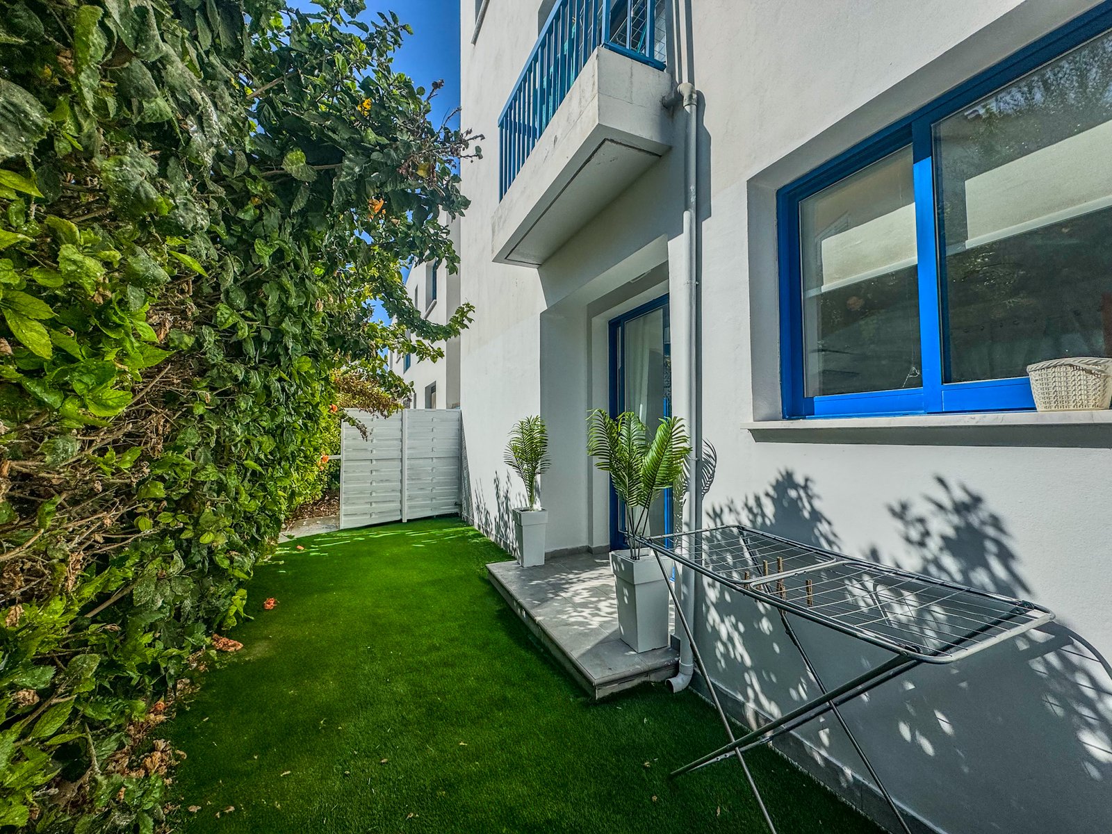 Charming Grecian-Style Ground Floor Apartment in Gated Complex