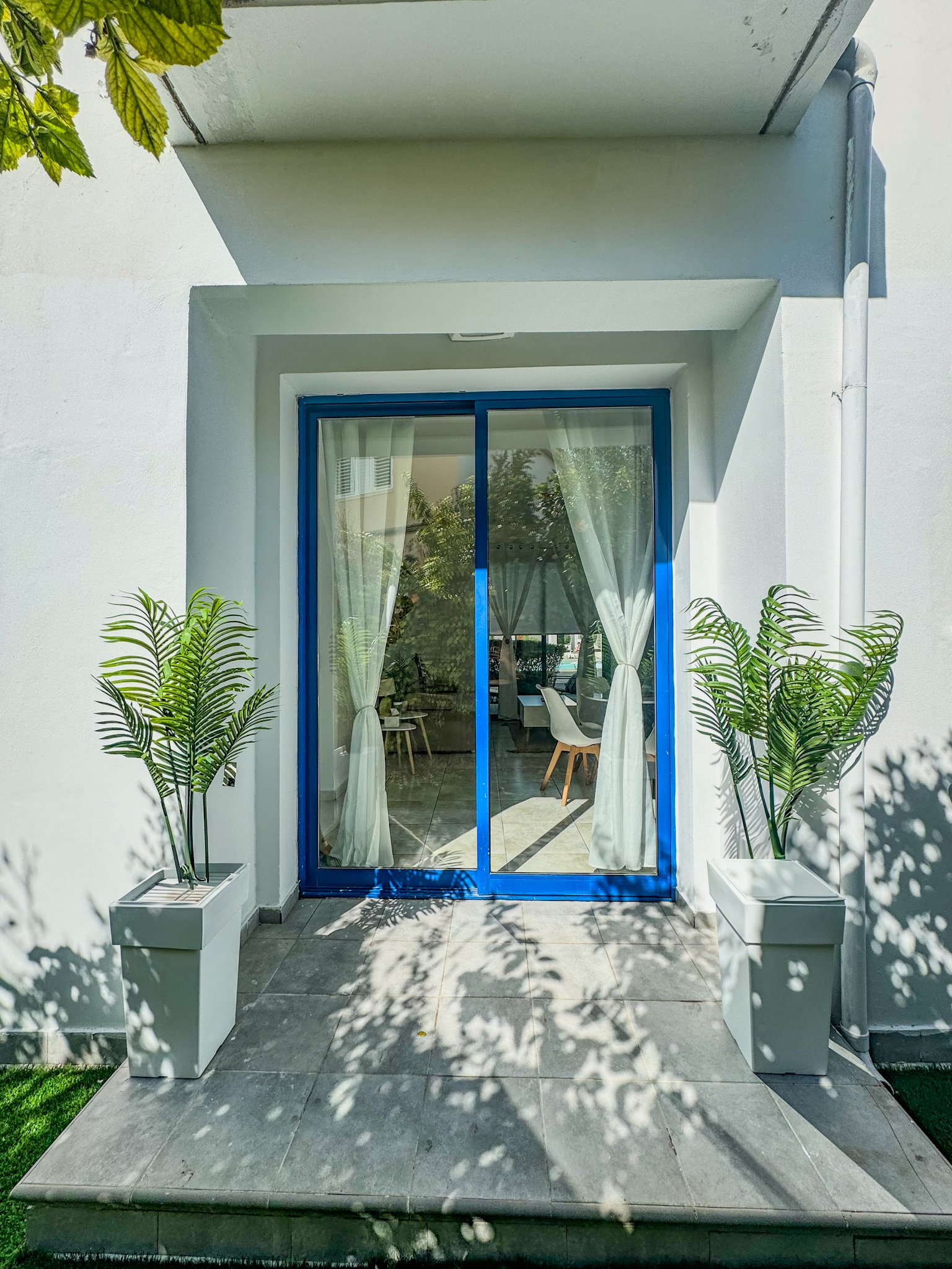Charming Grecian-Style Ground Floor Apartment in Gated Complex