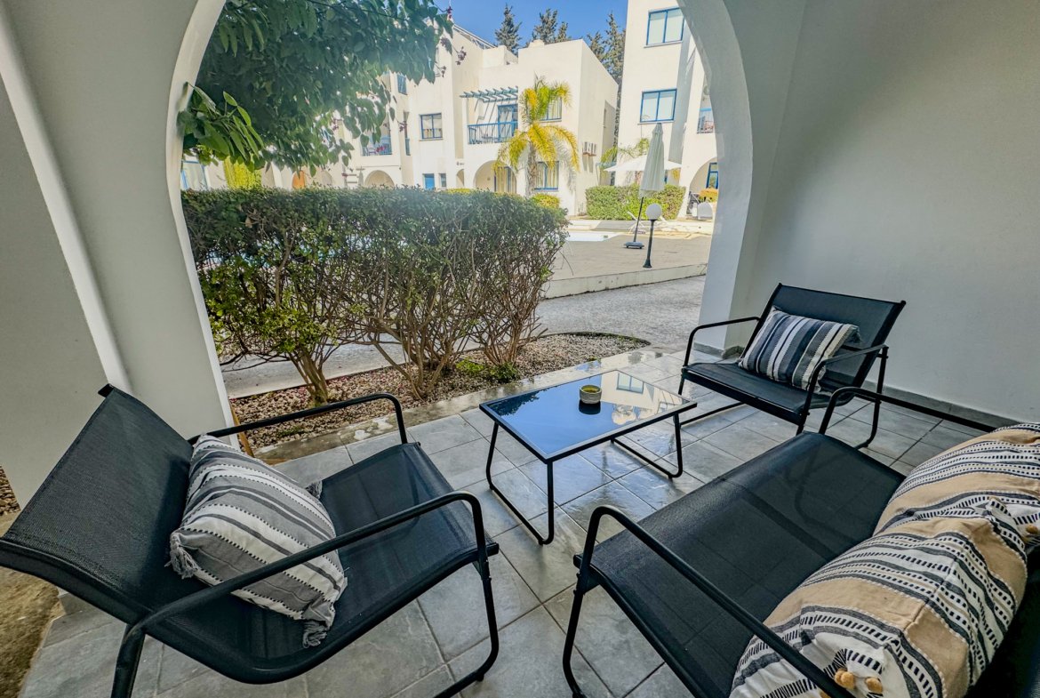 Charming Grecian-Style Ground Floor Apartment in Gated Complex