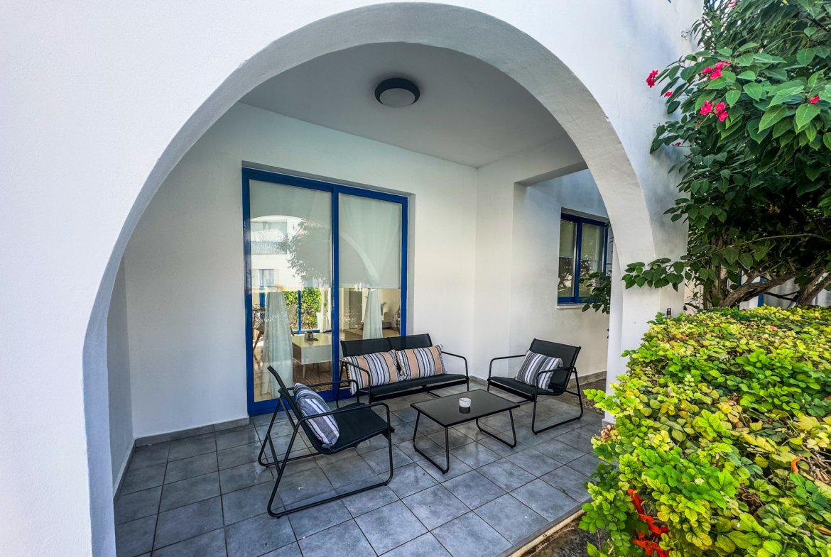 Charming Grecian-Style Ground Floor Apartment in Gated Complex