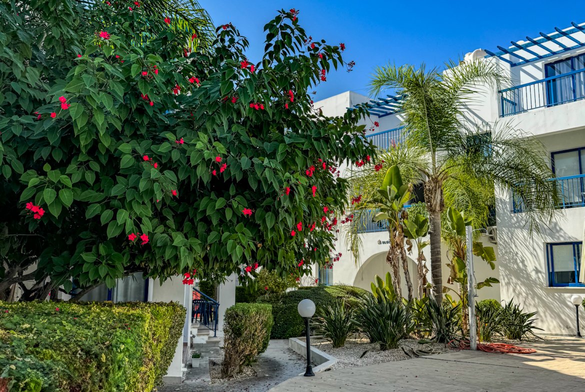 Charming Grecian-Style Ground Floor Apartment in Gated Complex