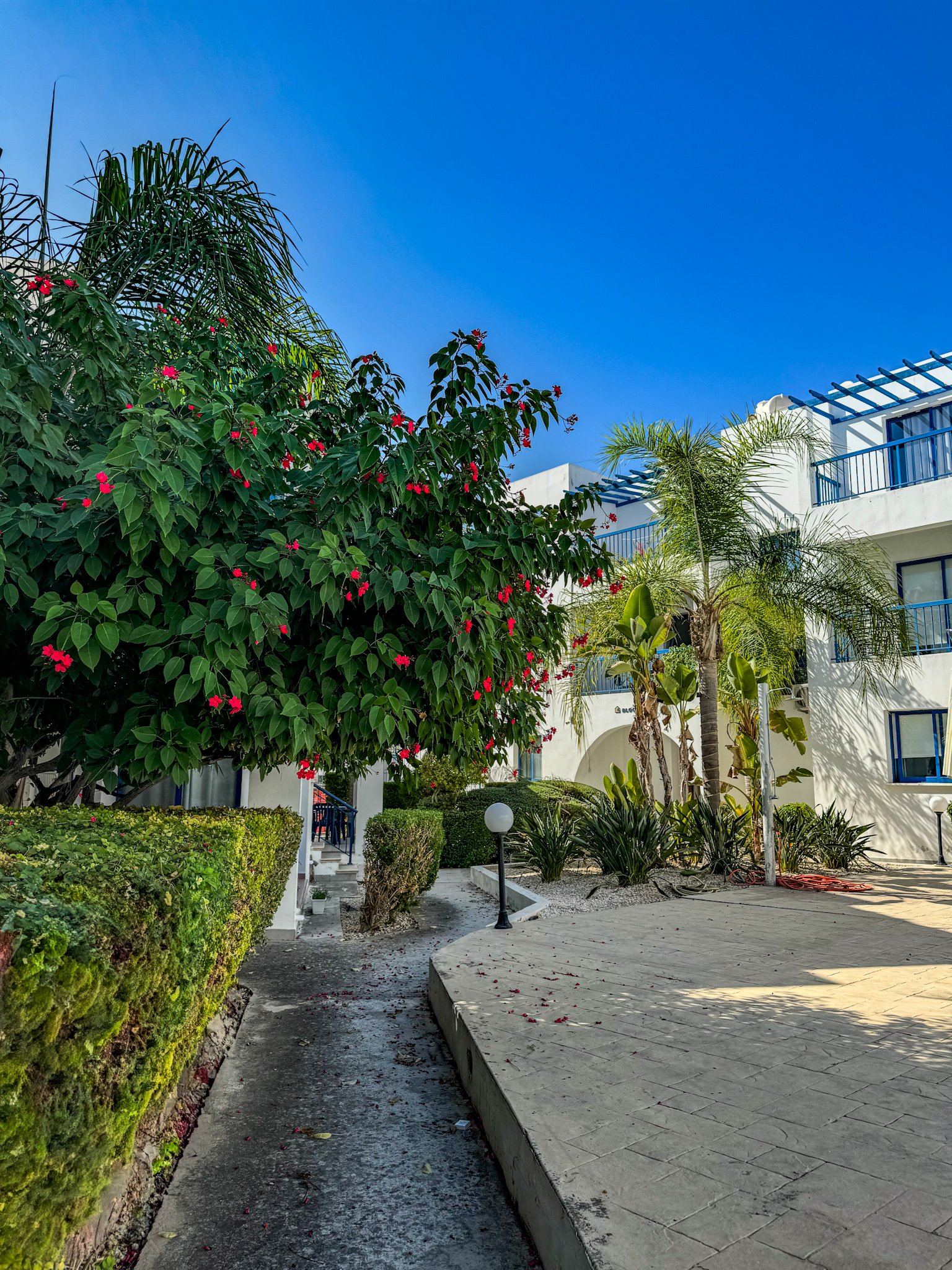 Charming Grecian-Style Ground Floor Apartment in Gated Complex