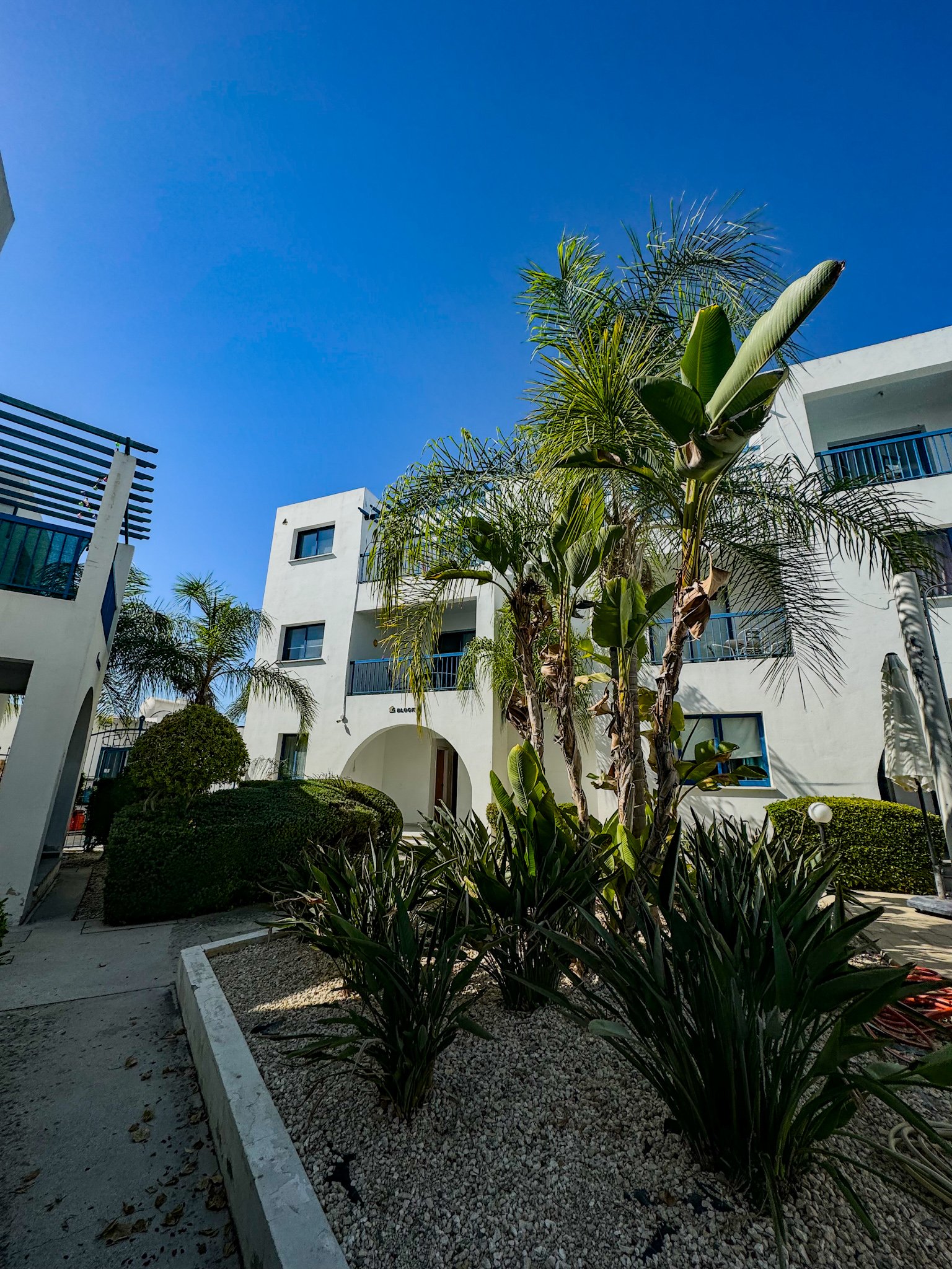 Charming Grecian-Style Ground Floor Apartment in Gated Complex