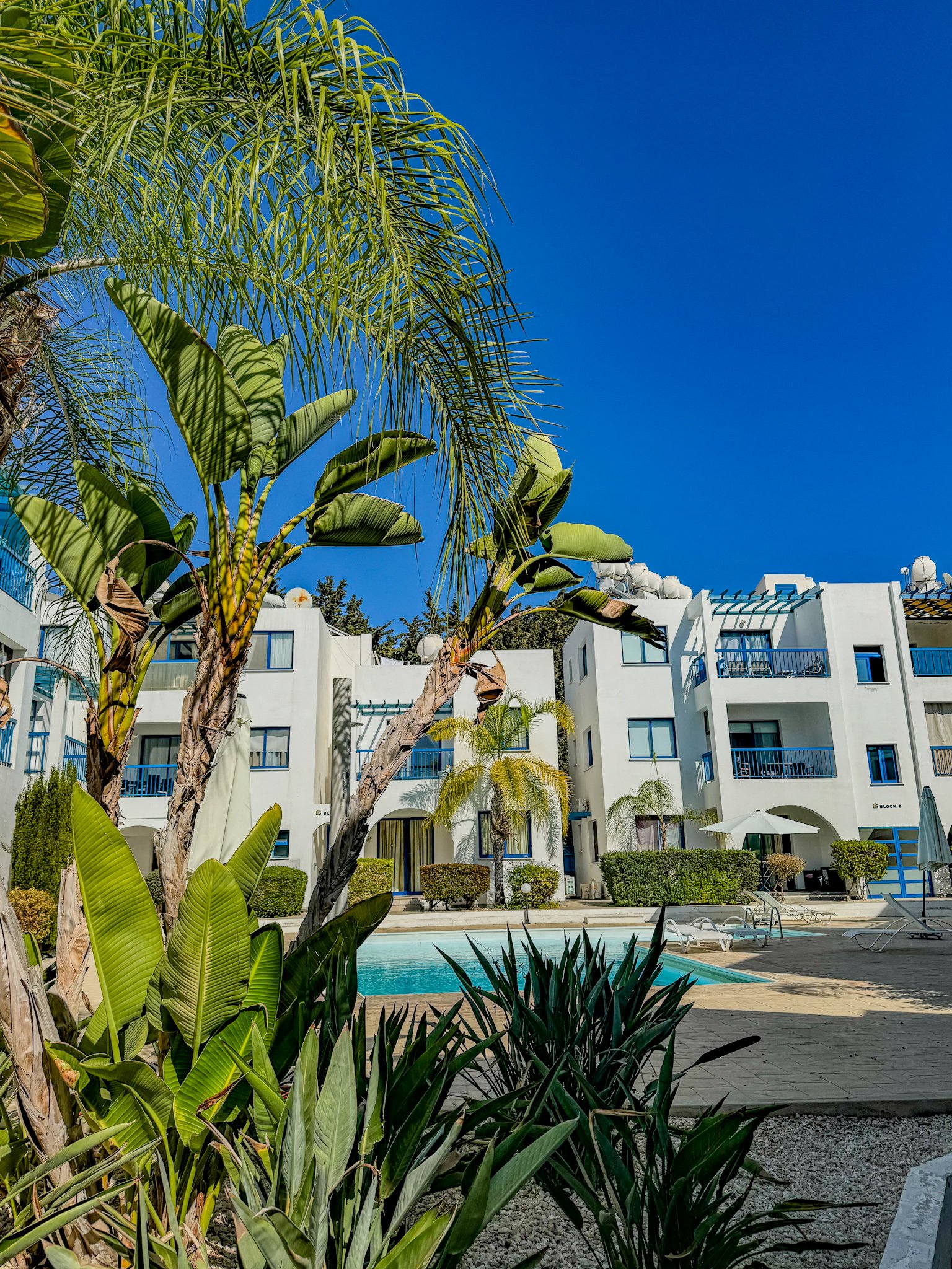 Charming Grecian-Style Ground Floor Apartment in Gated Complex