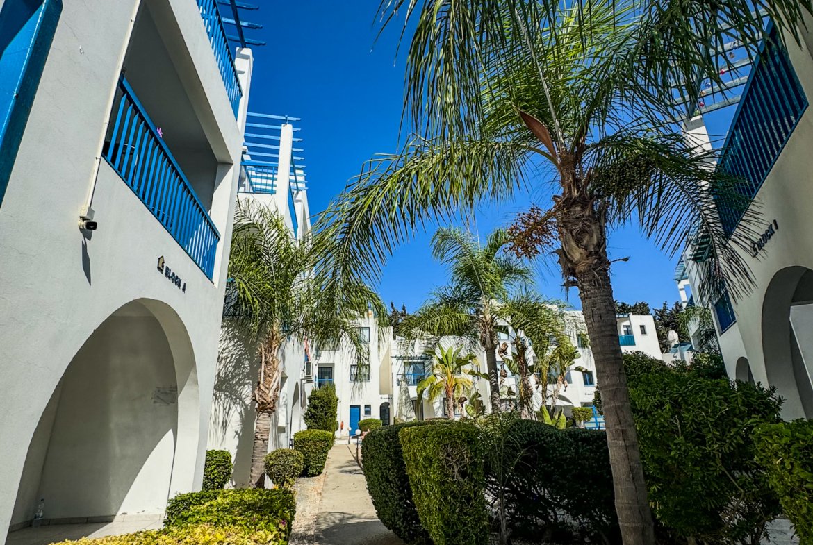 Charming Grecian-Style Ground Floor Apartment in Gated Complex