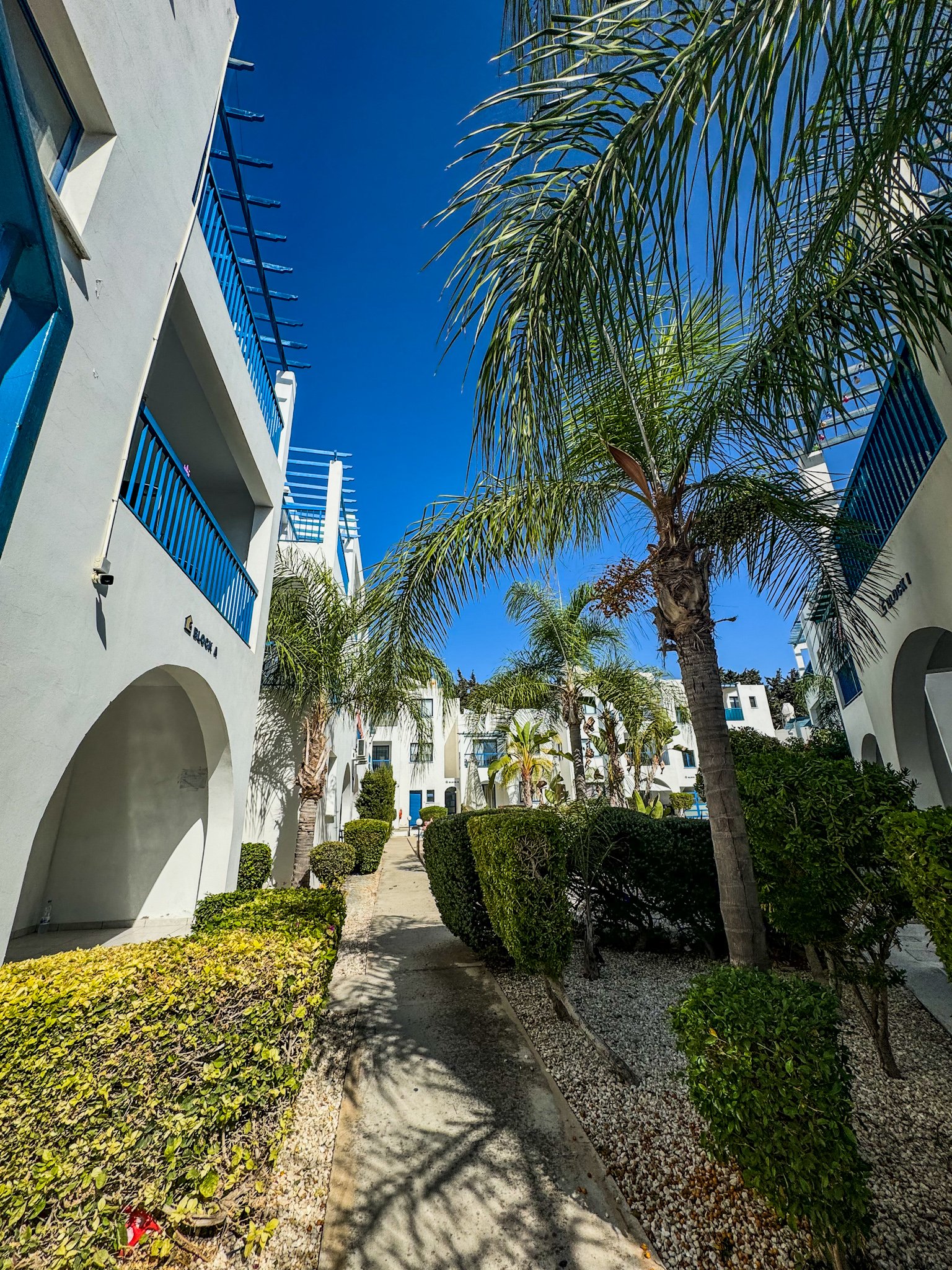 Charming Grecian-Style Ground Floor Apartment in Gated Complex