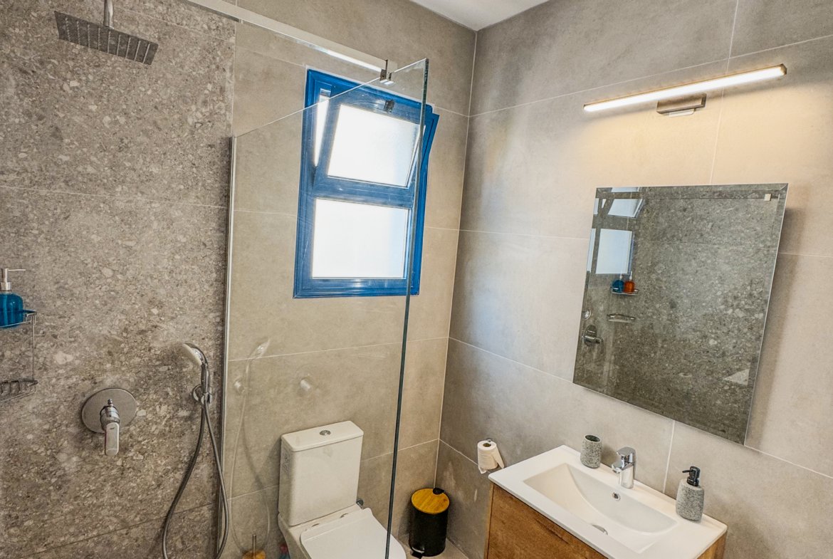 Charming Grecian-Style Ground Floor Apartment in Gated Complex