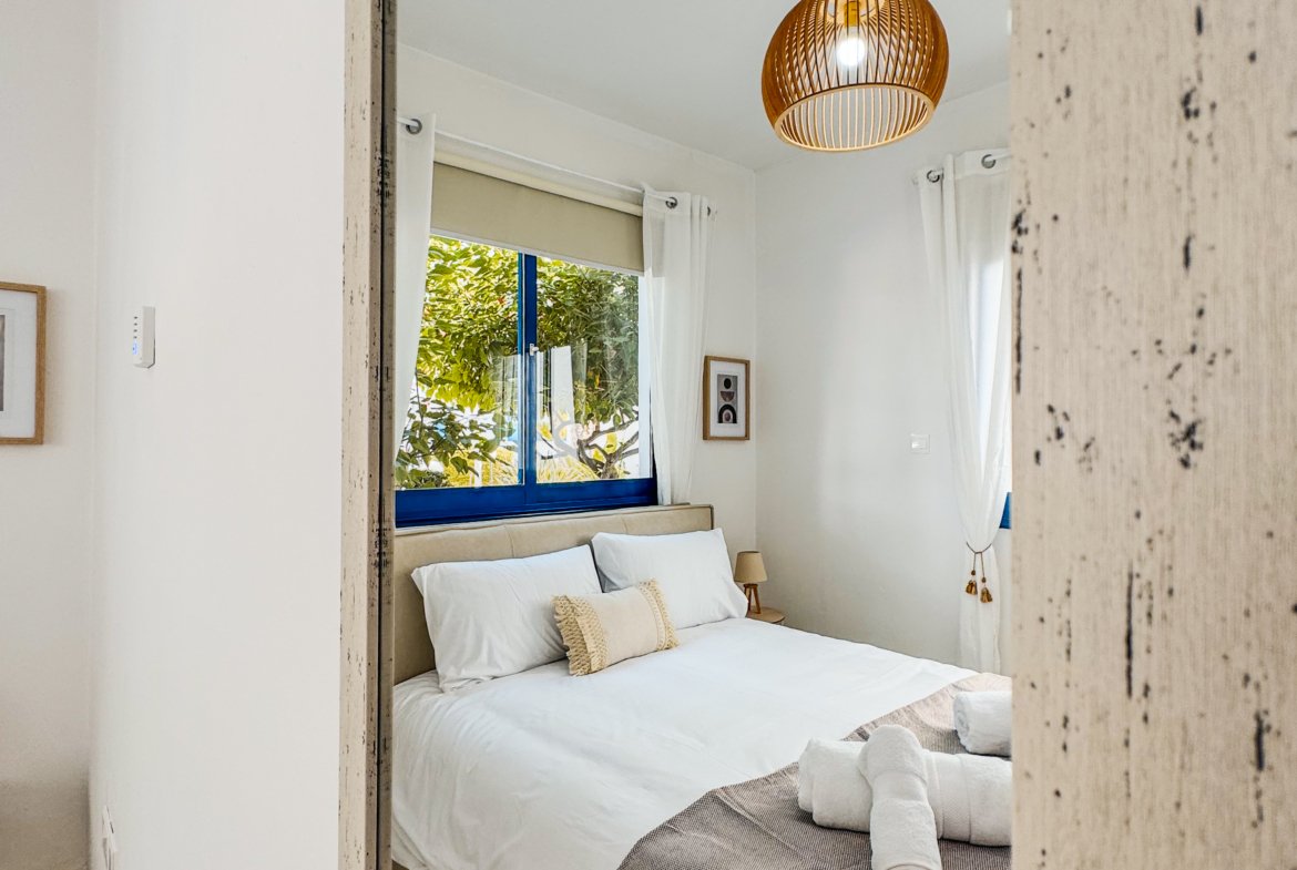 Charming Grecian-Style Ground Floor Apartment in Gated Complex