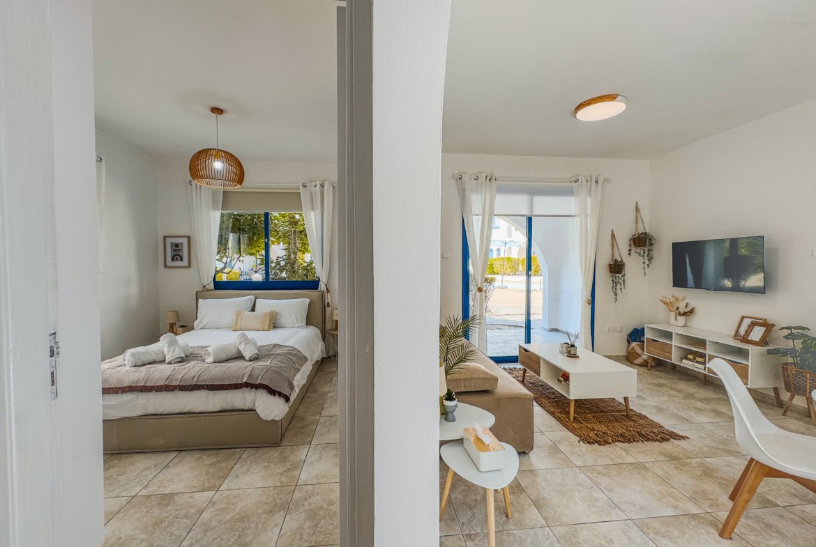 Charming Grecian-Style Ground Floor Apartment in Gated Complex