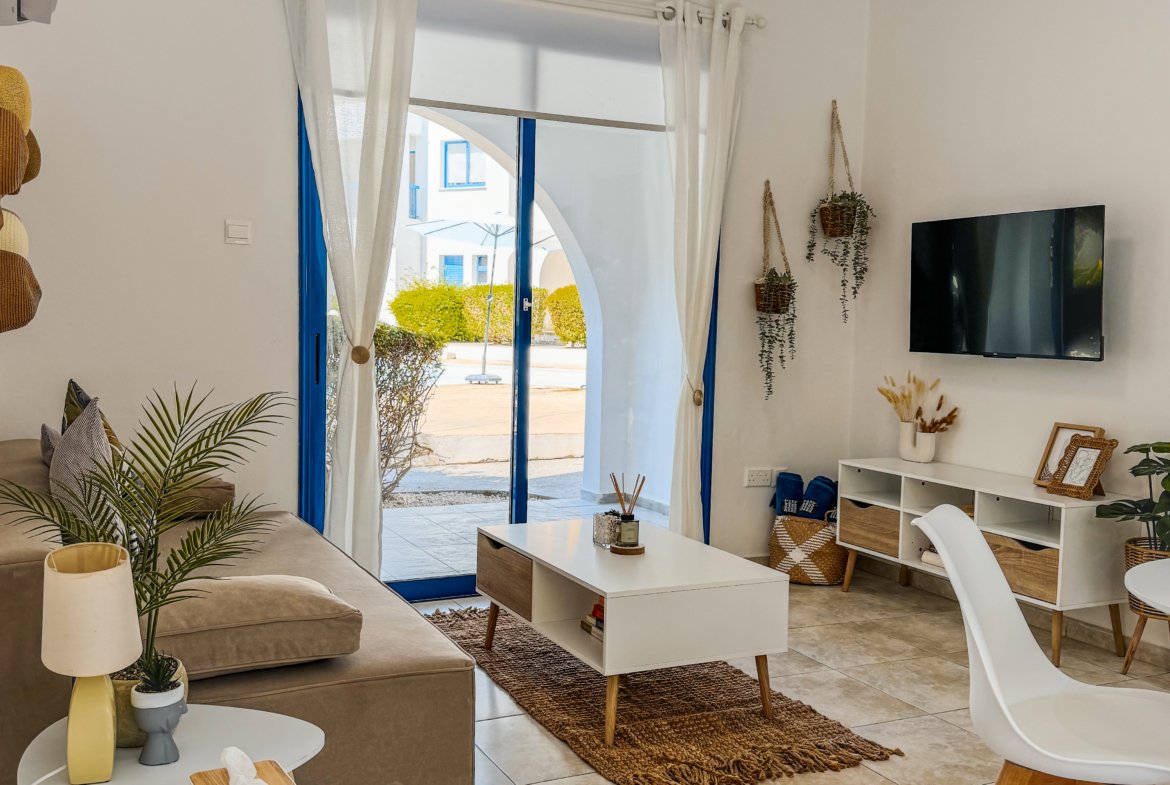 Charming Grecian-Style Ground Floor Apartment in Gated Complex