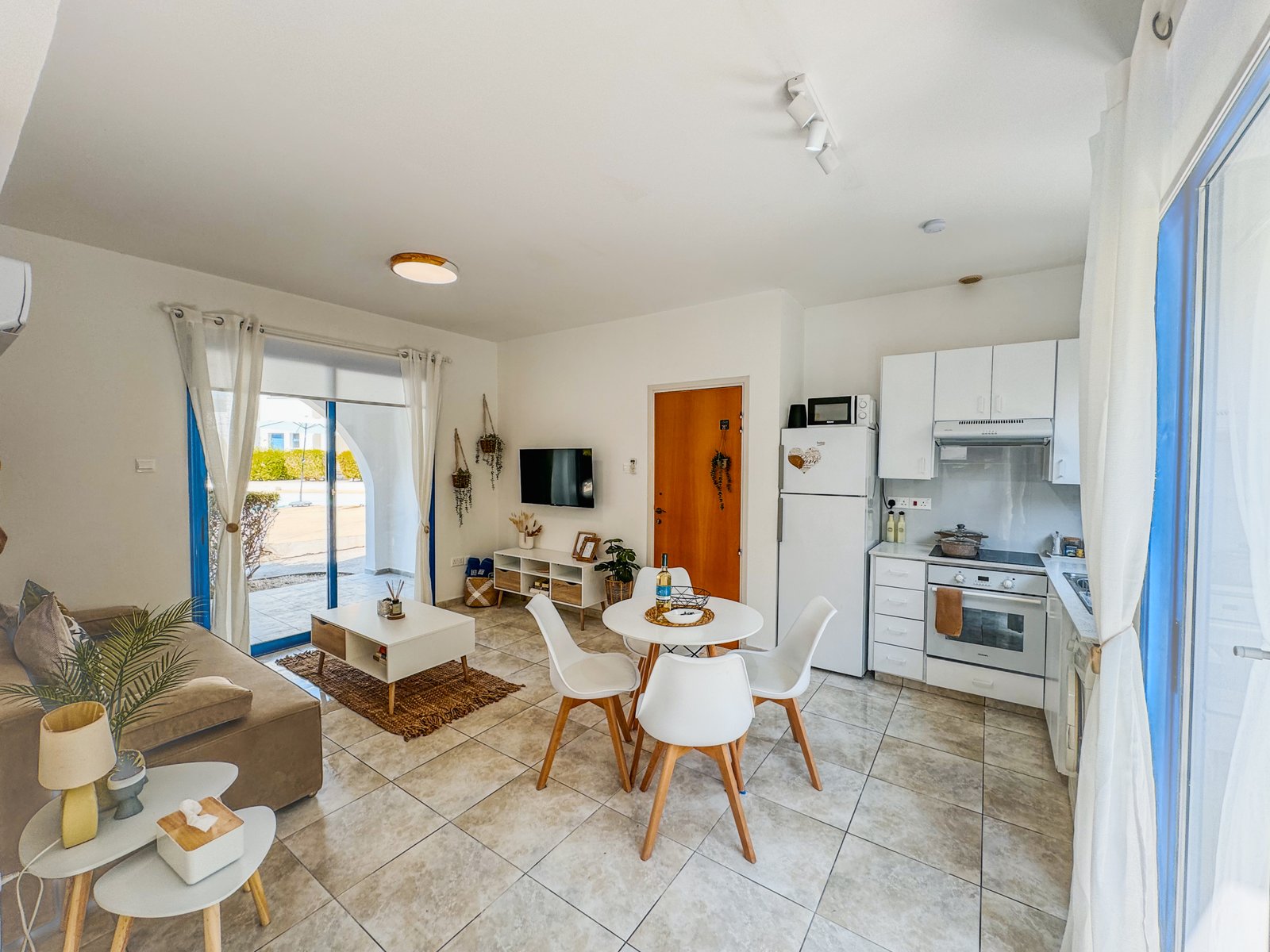 Charming Grecian-Style Ground Floor Apartment in Gated Complex
