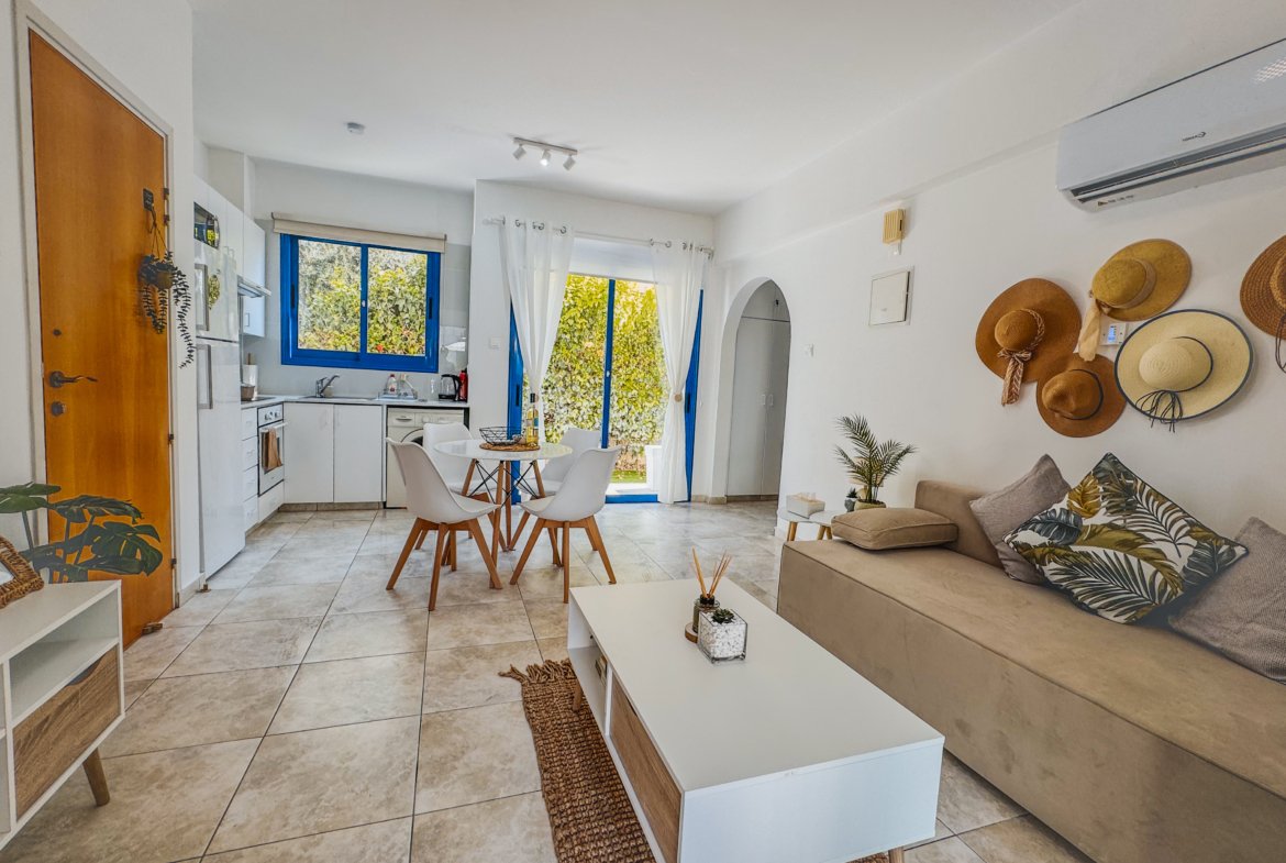Charming Grecian-Style Ground Floor Apartment in Gated Complex