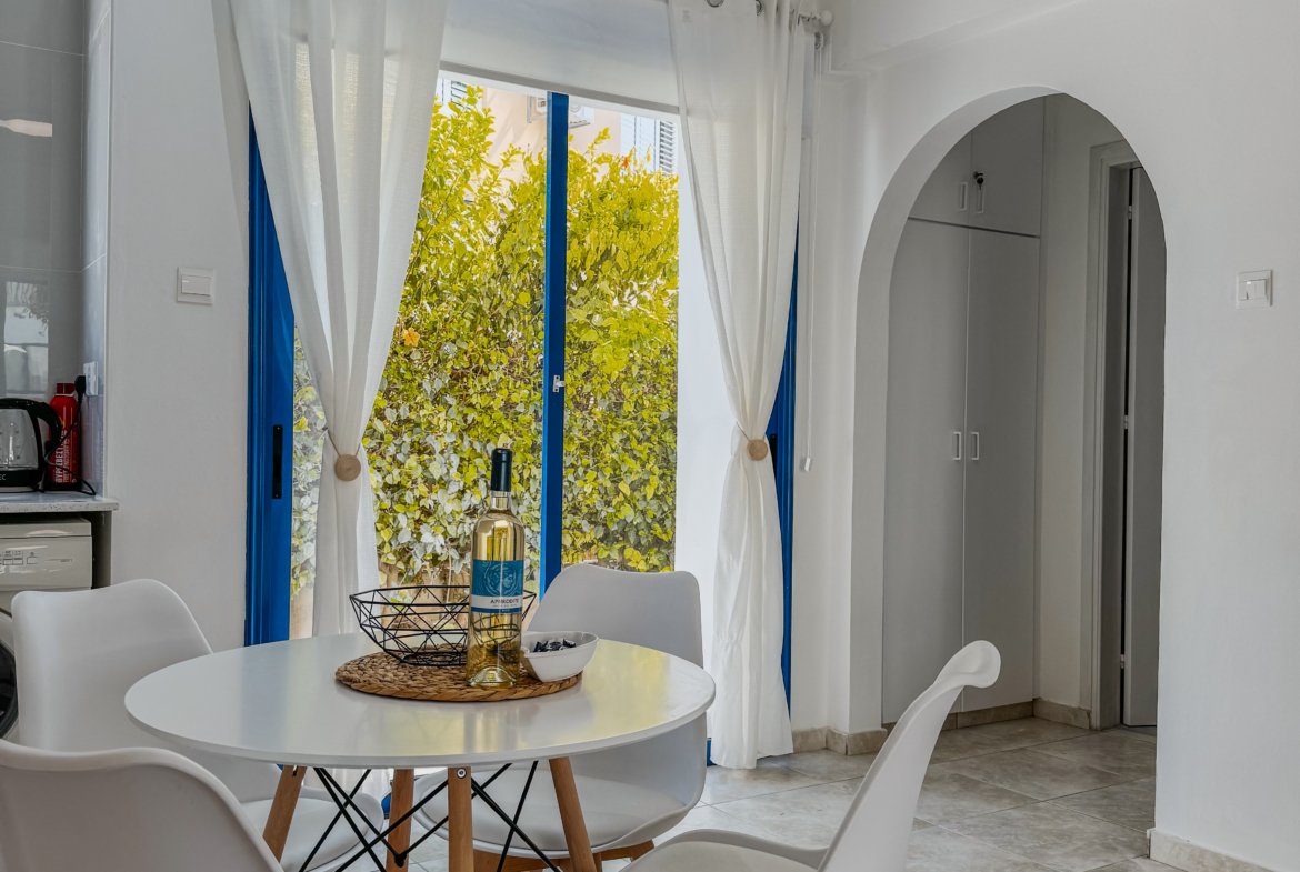 Charming Grecian-Style Ground Floor Apartment in Gated Complex
