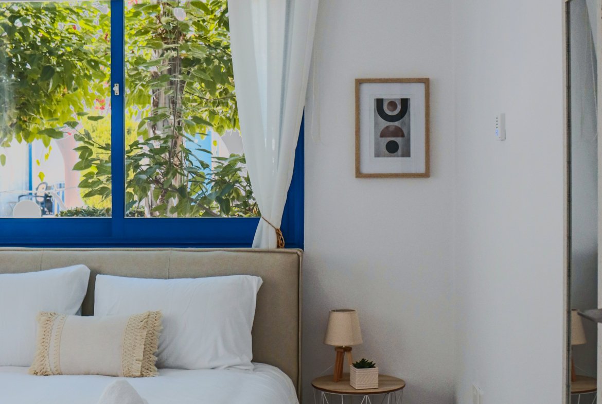 Charming Grecian-Style Ground Floor Apartment in Gated Complex