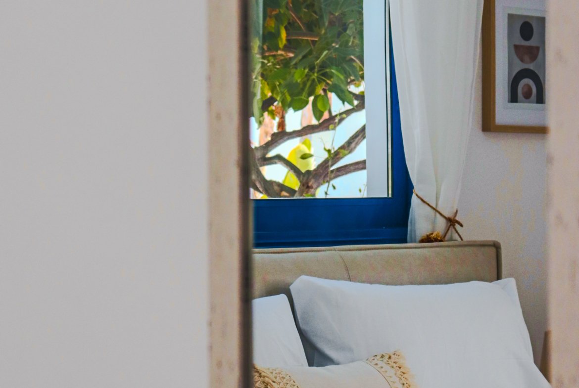 Charming Grecian-Style Ground Floor Apartment in Gated Complex