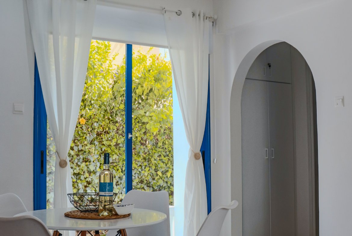 Charming Grecian-Style Ground Floor Apartment in Gated Complex