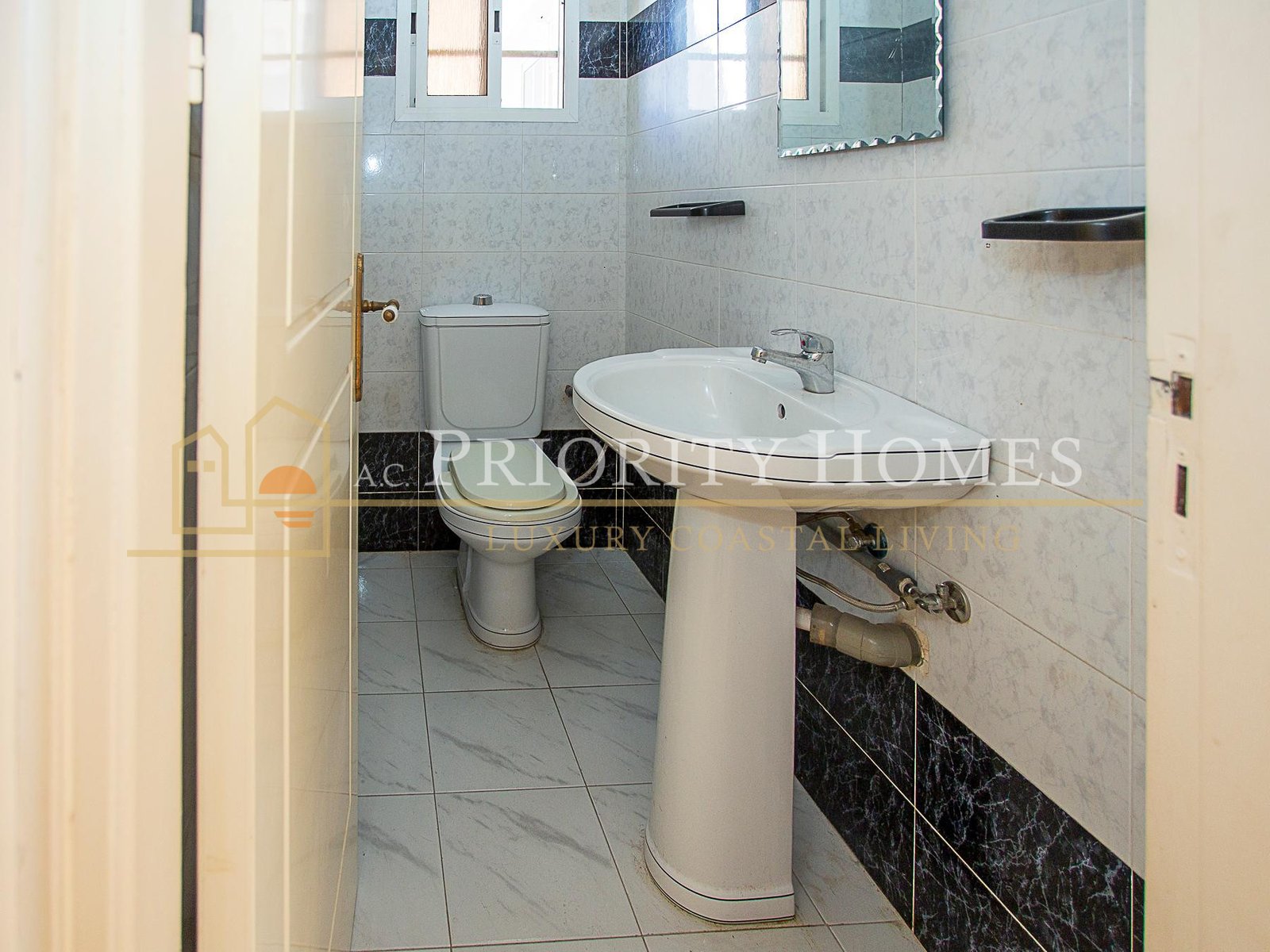 Three-Bedroom House with Semi-Basement for Sale in Emba
