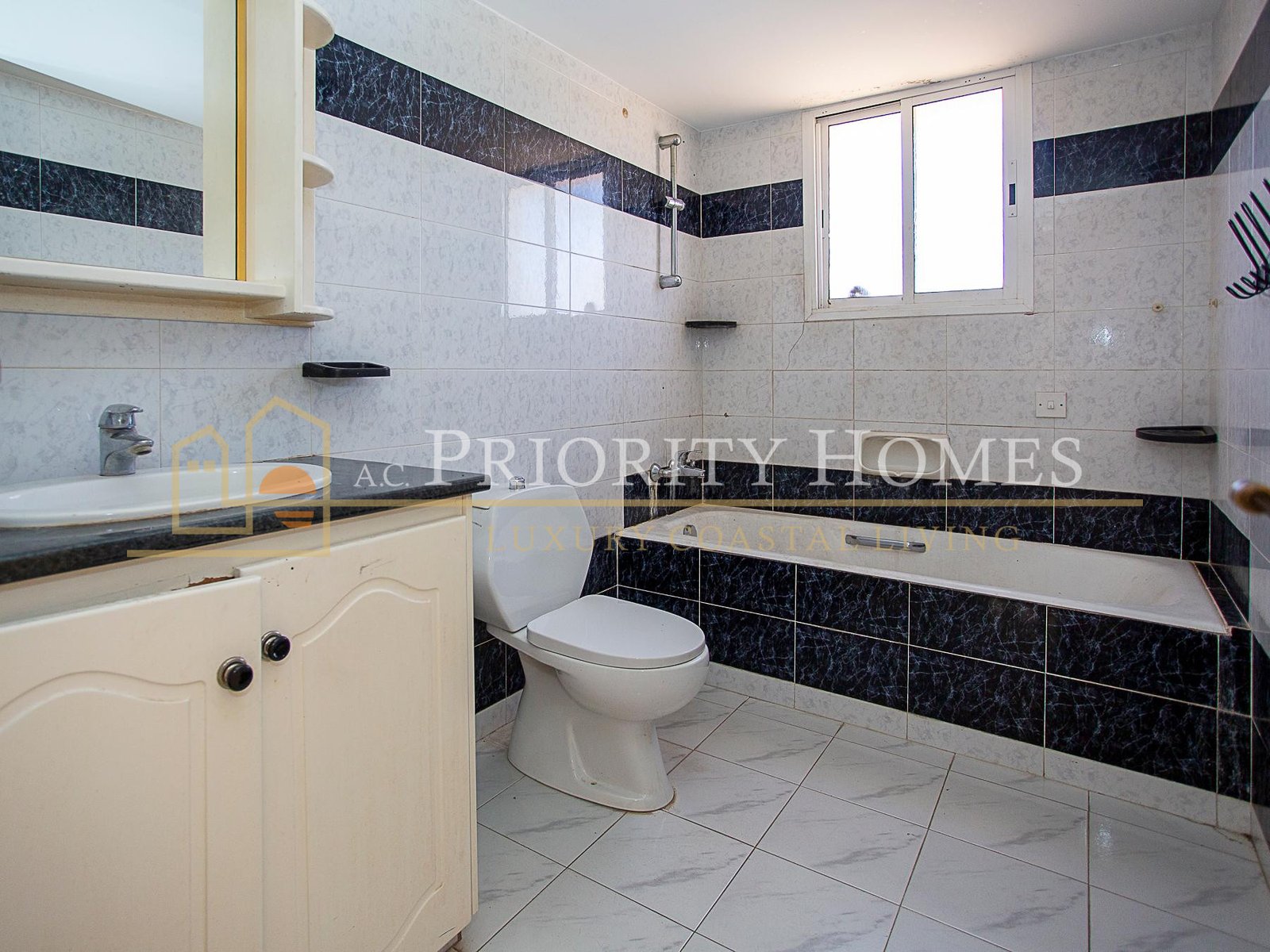 Three-Bedroom House with Semi-Basement for Sale in Emba
