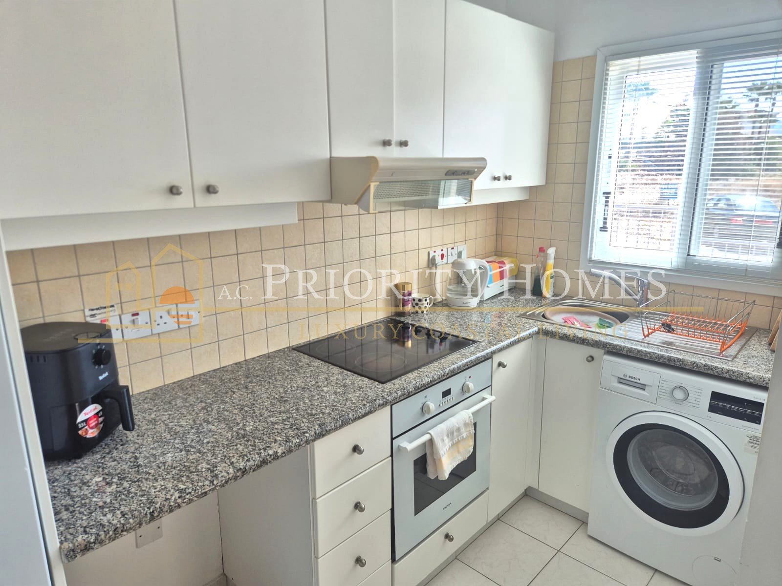 Two-Bedroom Two-Bathroom Townhouse in Pegeia