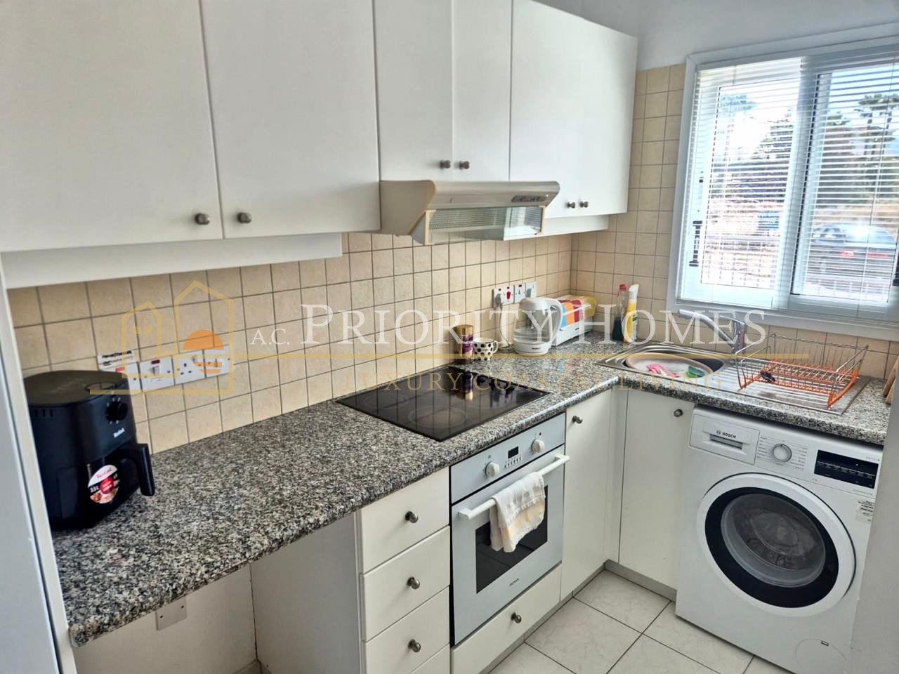 Two-Bedroom Two-Bathroom Townhouse in Pegeia